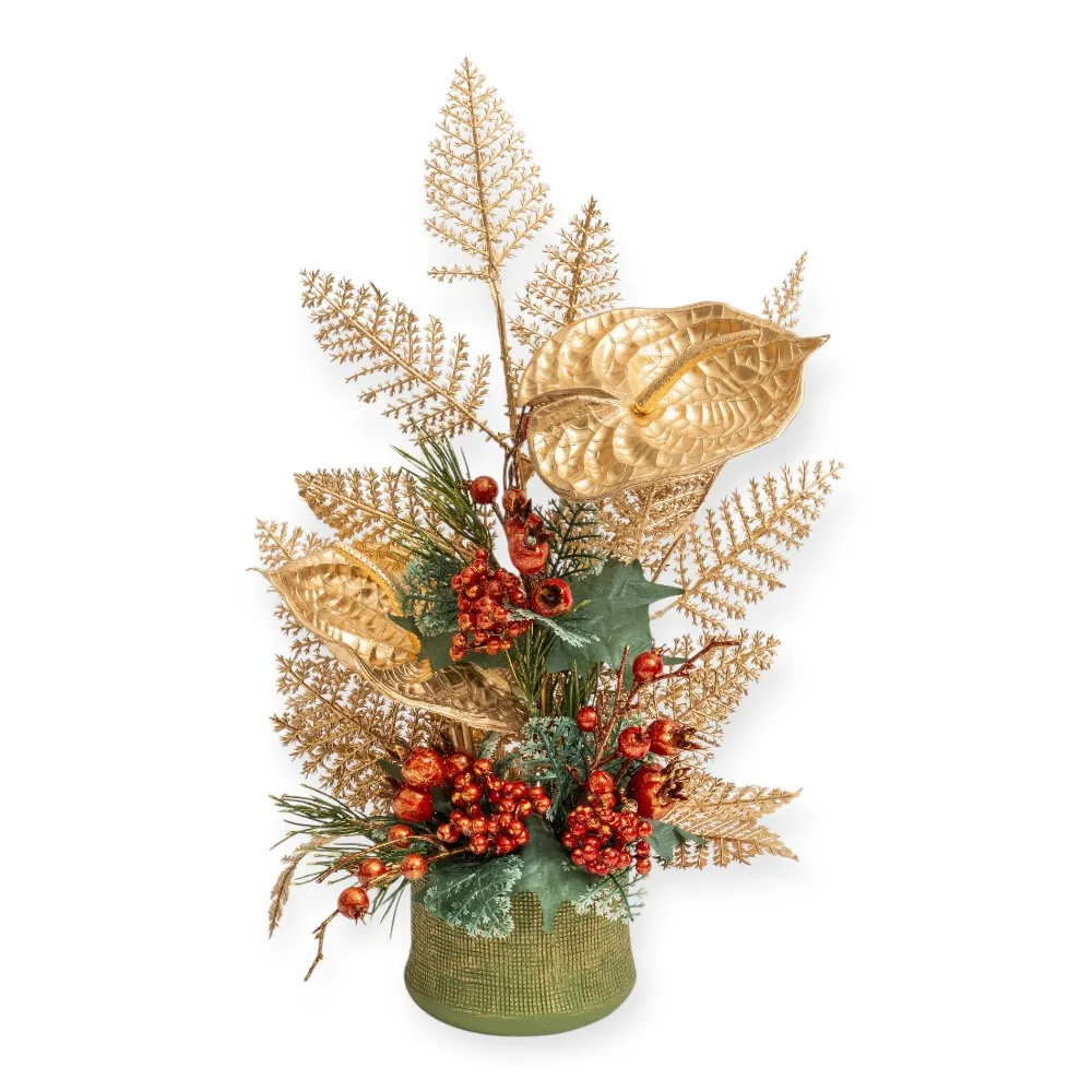 Composizione natalizia con anthurium dorato in vaso verde